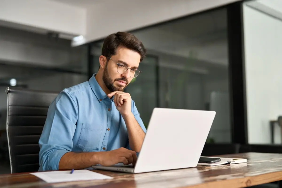 guy at computer writing blog